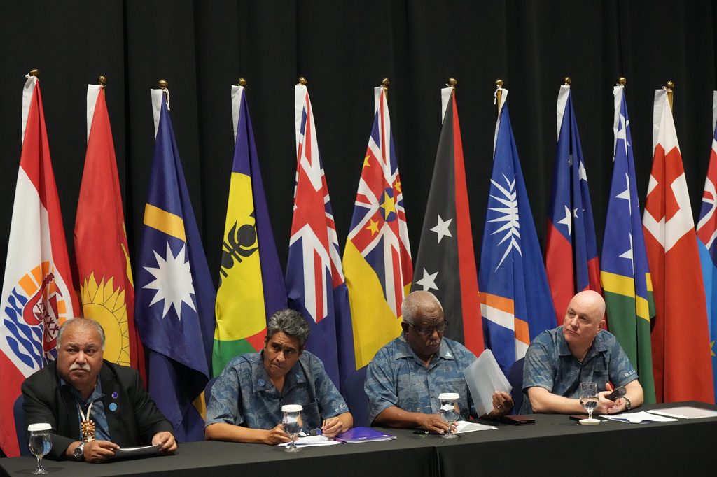 From left, Pacific Islands Forum Secretary-General Baron Waqa, Palau President Surangel Whipps Jr., Solomon Islands Foreign Minister Rick Houenipwela and New Zealand Prime Minister Christopher Luxon speak during a news conference at the Pacific Islands Forum Leaders Meeting in Koror, Palau, Thursday, Sept. 3, 2026. (AP Photo/Charlotte Graham-McLay)