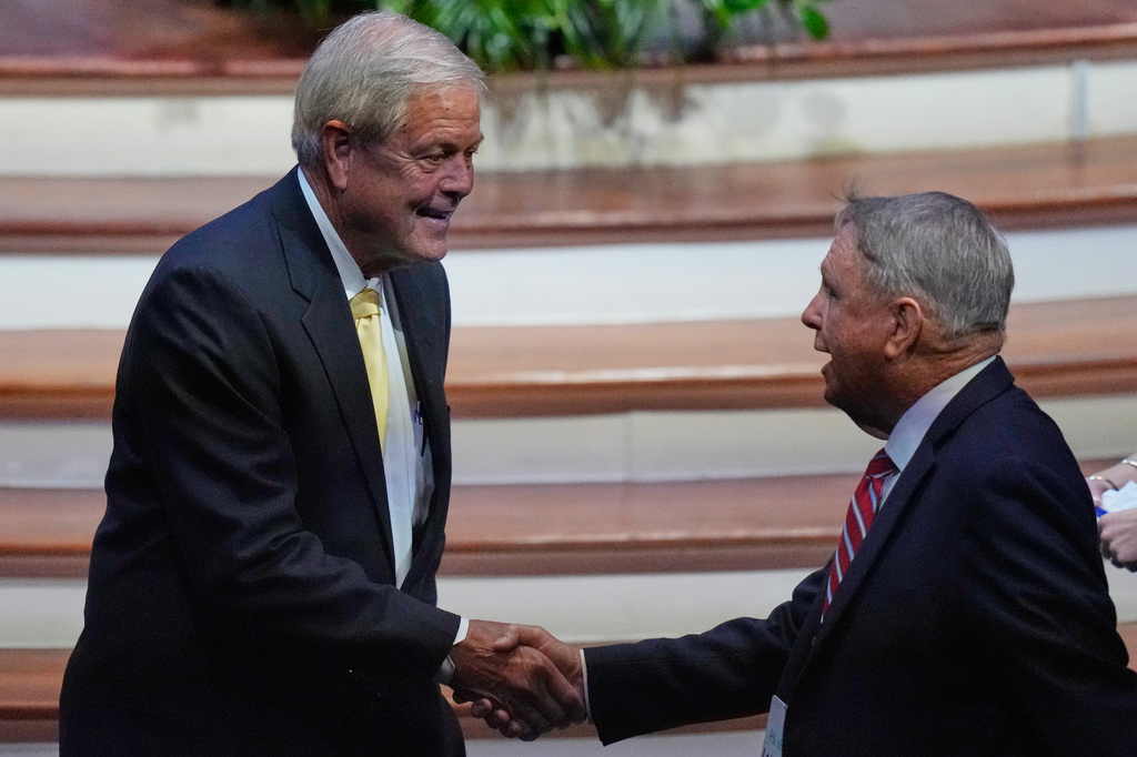 Rep. Ralph Norman, R-S.C., left, who is running to fill the seat of Sen. Lindsey Graham, R-S.C., greets an attendee before the late Sen. Graham's funeral at First Baptist Church in Columbia, S.C., Wednesday, July 29, 2026. (AP Photo/Gerald Herbert)