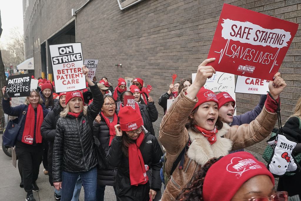Striking nurses demonstrate outside Mt. Sinai Hospital, in New York, Wednesday, Jan. 14, 2026. (AP Photo/Richard Drew)