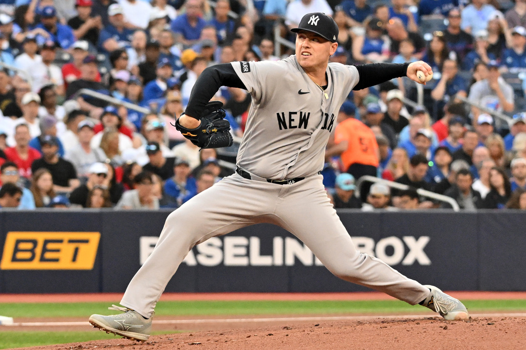 New York Yankees pitcher Ryan Weathers (40) throws to a Toronto Blue Jays batter during first inning of a baseball game in Toronto on Friday, June 12, 2026. (Jon Blacker/The Canadian Press via AP)