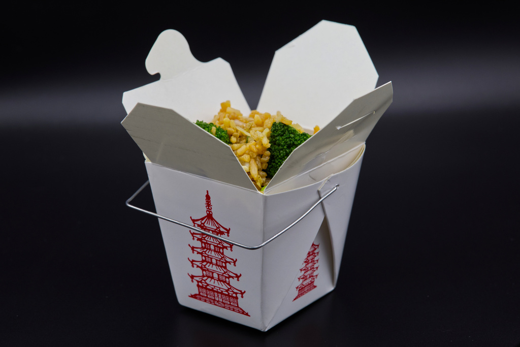 A Chinese takeout container with fried rice inside is photographed in Phoenix, May 12, 2026. (AP Photo/Dario Lopez-Mills)