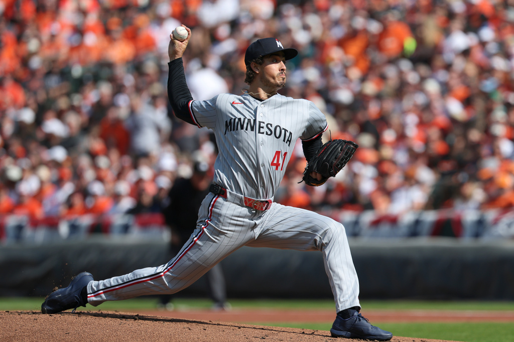 Minnesota Twins pitcher Joe Ryan (41) throws during the first inning of an opening-day baseball game against the Baltimore Orioles, Thursday, March. 26, 2026, in Baltimore. (AP Photo/Terrance Williams)