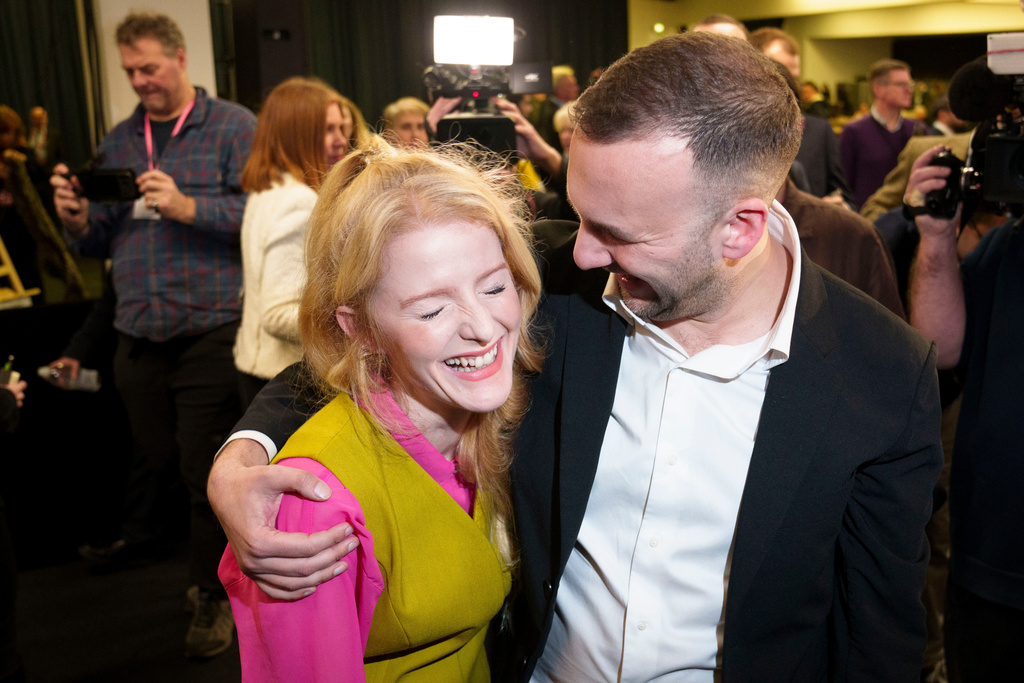 CORRECTS DATE - Greens Party candidate Hannah Spencer, left, stands with party leader Zack Polanski after winning the Gorton and Denton by-election, Manchester, England, Friday, Feb. 27, 2026. (AP Photo/Jon Super)