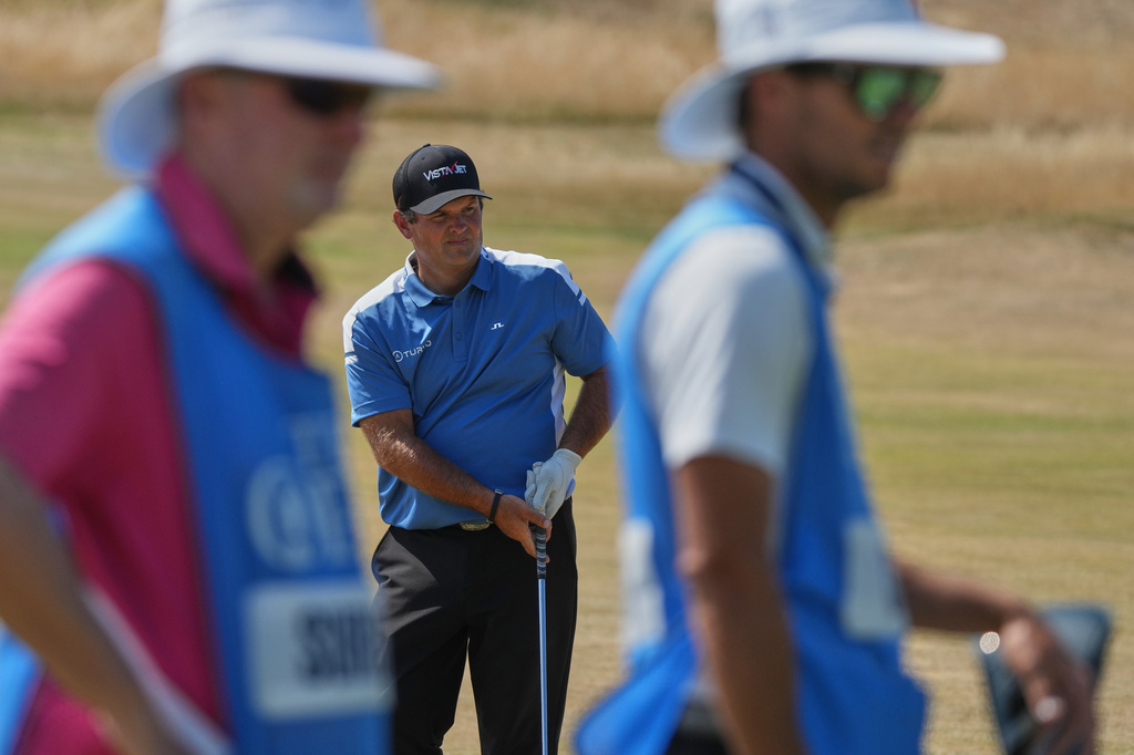 Patrick Reed of the United States watches his putt on the 14th green during a practice round for the British Open Golf championships at Royal Birkdale golf club, in Southport, England, Tuesday, July 14, 2026. (AP Photo/Jon Super)