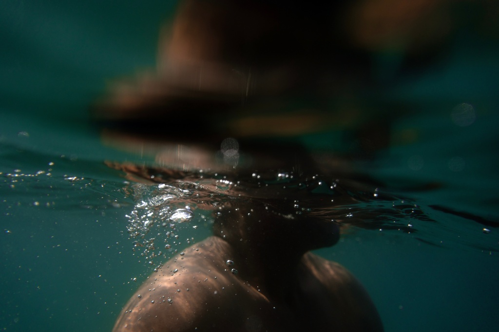 Fisherman Pancho Contreras dives into the sea to observe corals near Los Arrecifes, Mexico, Oct. 26, 2025. (AP Photo/Felix Marquez)