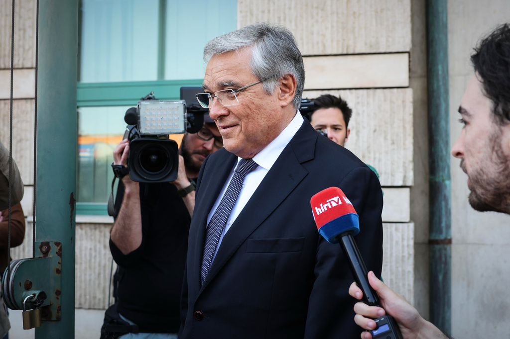 FILE - Russia's ambassador to Hungary, Evgeny Stanislavov, is surrounded by media as he leaves the Hungarian Foreign Ministry building, in Budapest, Thursday, May 14, 2026. (AP Photo, File)