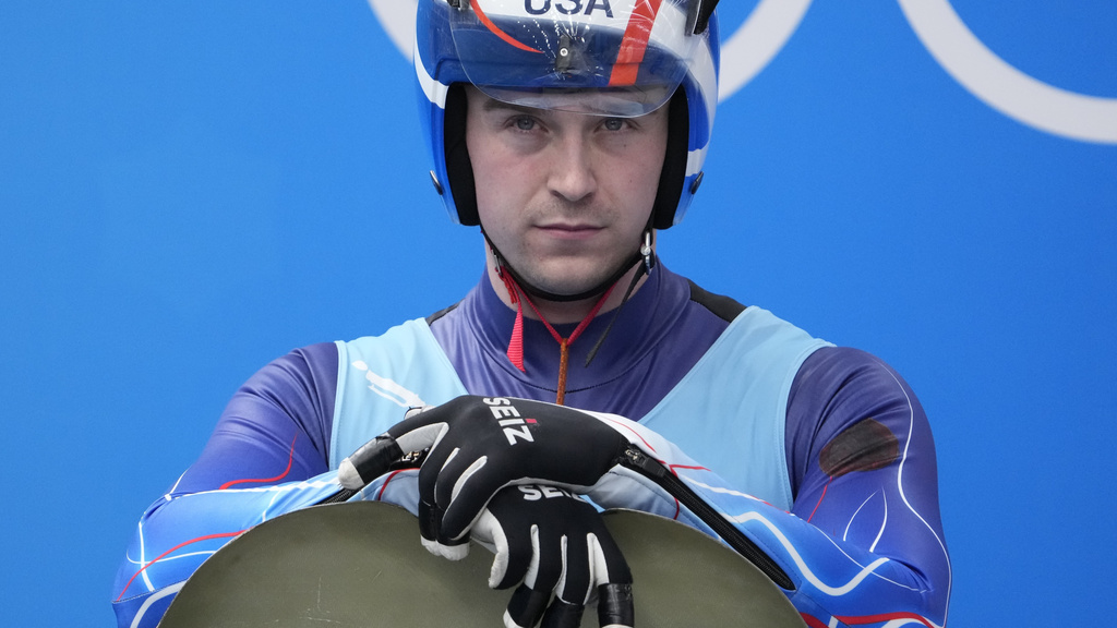 FILE - Tucker West, of the United States, prepares to start the luge men's single round 3 at the 2022 Winter Olympics, Feb. 6, 2022, in the Yanqing district of Beijing. (AP Photo/Pavel Golovkin, File)