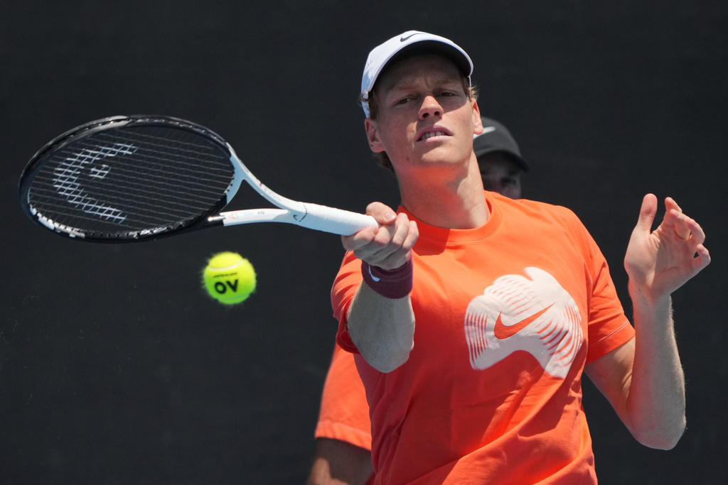 Jannik Sinner of Italy plays a forehand return to during a practice session ahead of the Australian Open tennis championship in Melbourne, Australia, Friday, Jan. 16, 2026. (AP Photo/Dita Alangkara)