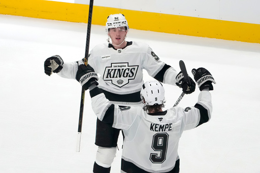 Los Angeles Kings' Brandt Clarke (92) celebrates with Adrian Kempe (9) after scoring a goal against the San Jose Sharks during the third period of an NHL hockey game in San Jose, Calif., Tuesday, Oct. 28, 2025. (AP Photo/Tony Avelar) Los Angeles Kings' Brandt Clarke (92) celebrates with Adrian Kempe (9) after scoring a goal against the San Jose Sharks during the third period of an NHL hockey game in San Jose, Calif., Tuesday, Oct. 28, 2025. (AP Photo/Tony Avelar)
