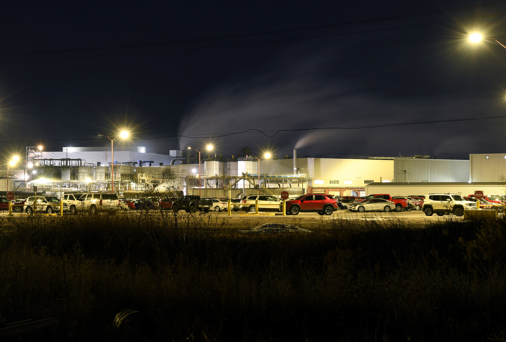 Steam rises from chimneys during the night shift at the Tyson Foods' beef plant in Lexington, Neb., Wednesday, Dec. 3, 2025. (AP Photo/Thomas Peipert)