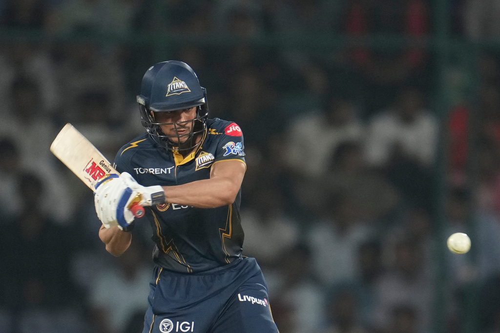 Gujarat Titans' captain Shubman Gill plays a shot during the Indian Premier League cricket match between Delhi Capitals and Gujarat Titans in New Delhi, India, Wednesday, April. 8, 2026. (AP Photo/ Manish Swarup)