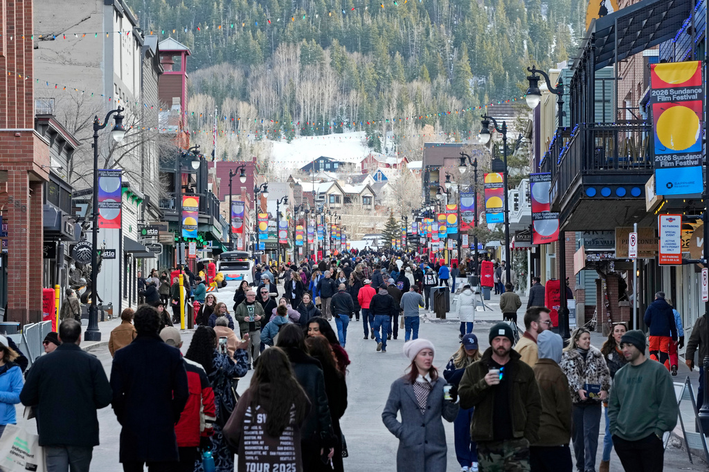 Pedestrians walk down Main Street on the first day of the 2026 Sundance Film Festival on Thursday, Jan. 22, 2026, in Park City, Utah. (Photo by Charles Sykes/Invision/AP)