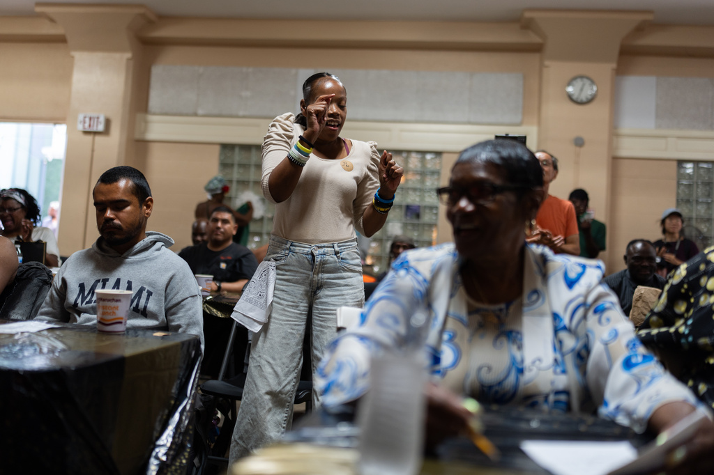 A contestant who goes by the nickname Lil Bit dances while watching another contestant perform during Skid Row's inaugural talent show in downtown Los Angeles, Saturday, Sept. 19, 2026. (AP Photo/Jae C. Hong)