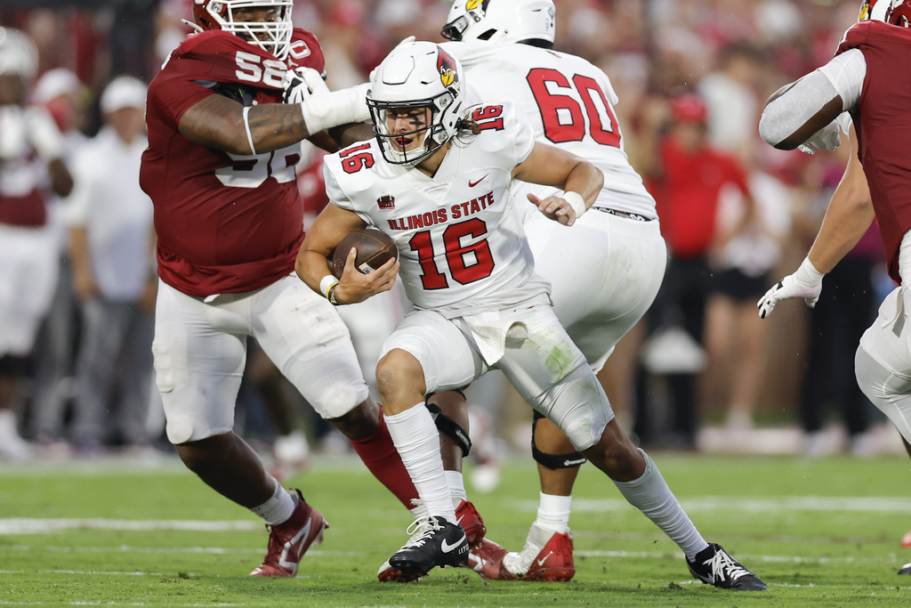 Illinois State quarterback Tommy Rittenhouse (16) runs against Oklahoma during the first half of an NCAA college football game, Saturday, Aug. 30, 2025, in Norman, Okla. (AP Photo/Alonzo Adams)