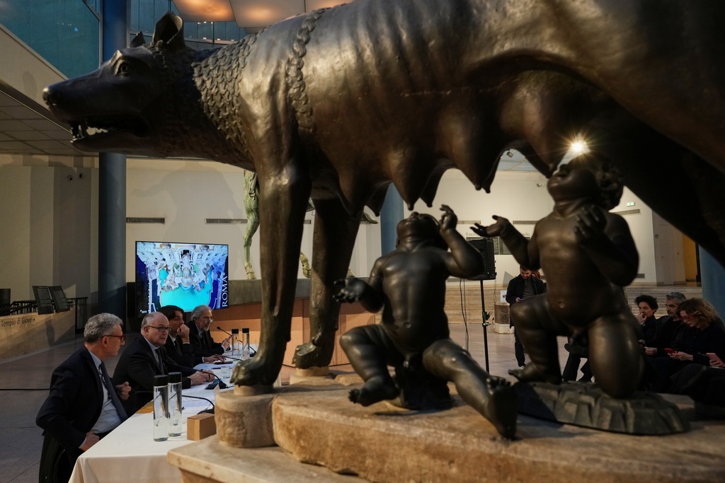 Rome's Mayor Roberto Gualtieri, second from left, announces at a press conference that starting on Feb. 1, it will impose a 2 euro fee for tourists to get close to the Trevi Fountain, in Rome, Friday, Dec. 19, 2025, . (AP Photo/Andrew Medichini)