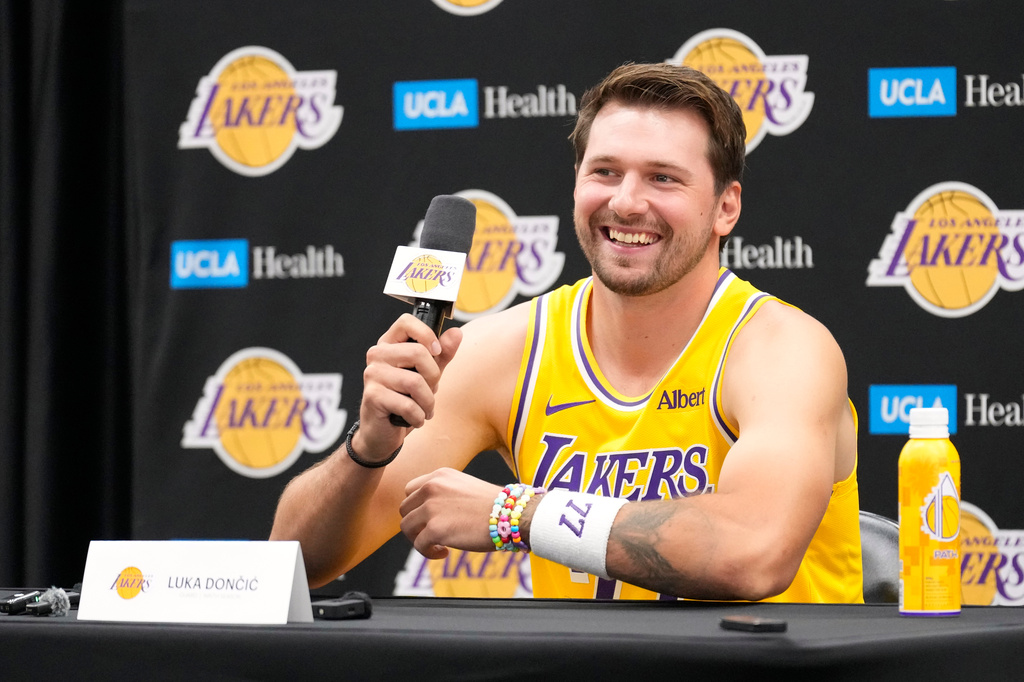 Los Angeles Lakers guard Luka Doncic gestures as he speaks to the media during media day Monday, Sept. 28, 2026, in El Segundo, Calif. (AP Photo/Mark J. Terrill)