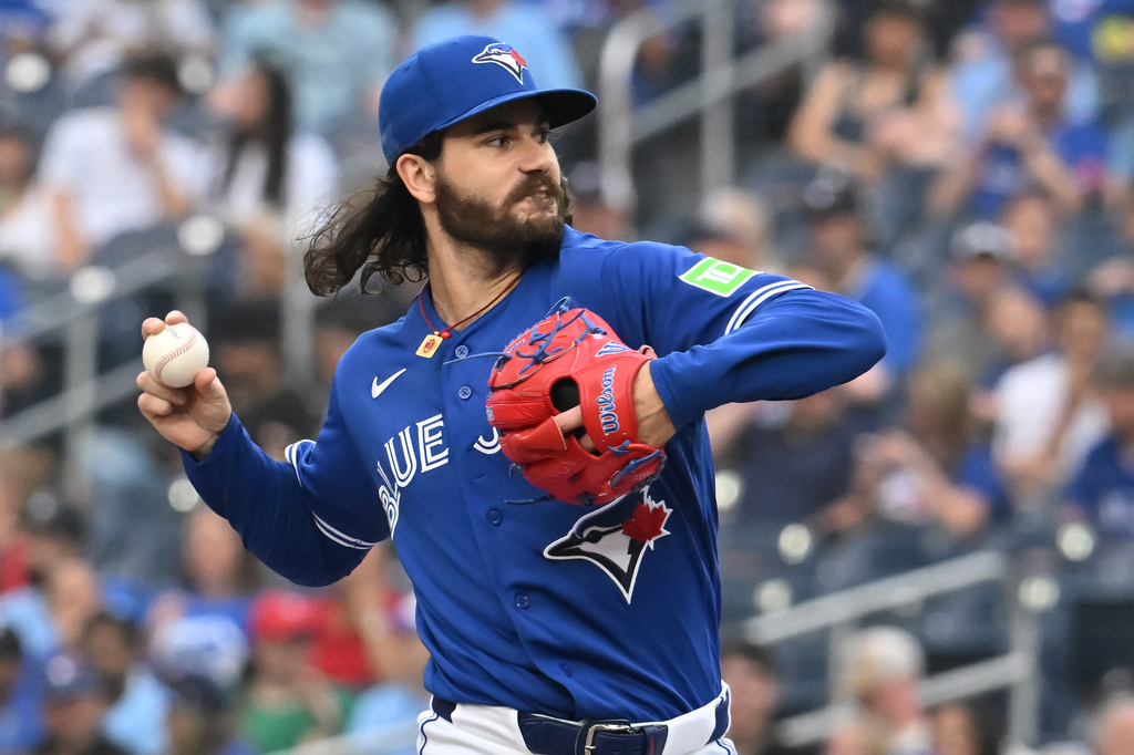 Toronto Blue Jays pitcher Dylan Cease throws to a Tampa Bay Rays batter during the first inning of a baseball game in Toronto, Monday, July 20, 2026. (Jon Blacker/The Canadian Press via AP)