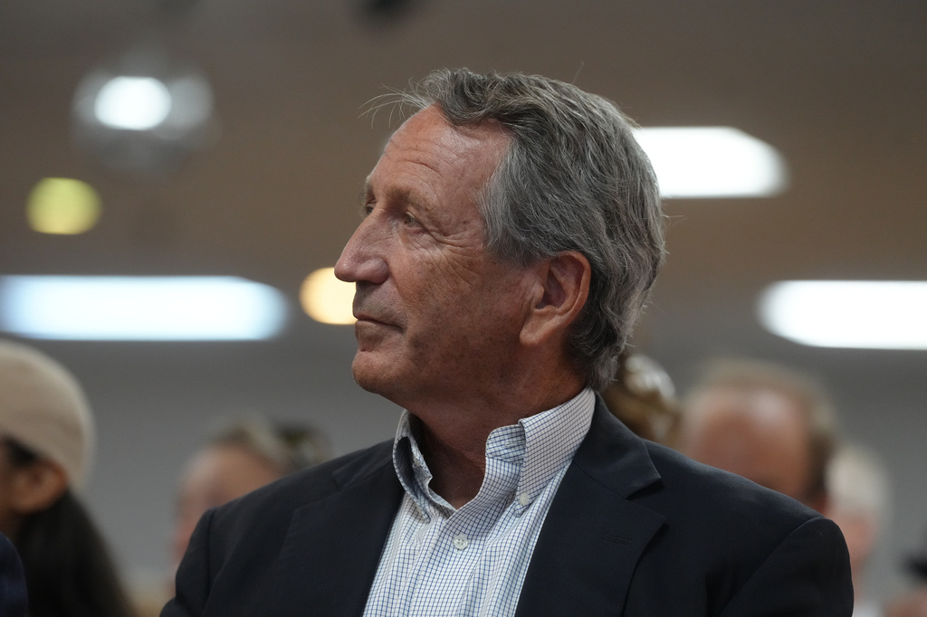 Former Gov. Mark Sanford, R-S.C., watches as he waits to speak at a candidate event days before the special South Carolina Republican primary to replace Sen. Lindsey Graham, R-S.C., Thursday, Aug. 6, 2026, in Charleston, S.C. (AP Photo/Meg Kinnard)