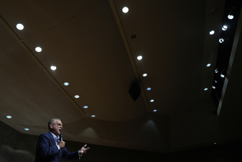 Republican Rep. Mark Alford addresses attendees at a town hall, Monday, Aug. 25, 2025, in Bolivar, Mo. (AP Photo/Charlie Riedel)