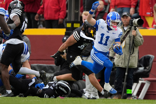 BYU wide receiver Parker Kingston (11) runs the ball as he gets free from Iowa State's defense during the first half of an NCAA college football game, Saturday, Oct. 25, 2025, in Ames, Iowa. (AP Photo/Matthew Putney) BYU wide receiver Parker Kingston (11) runs the ball as he gets free from Iowa State's defense during the first half of an NCAA college football game, Saturday, Oct. 25, 2025, in Ames, Iowa. (AP Photo/Matthew Putney)