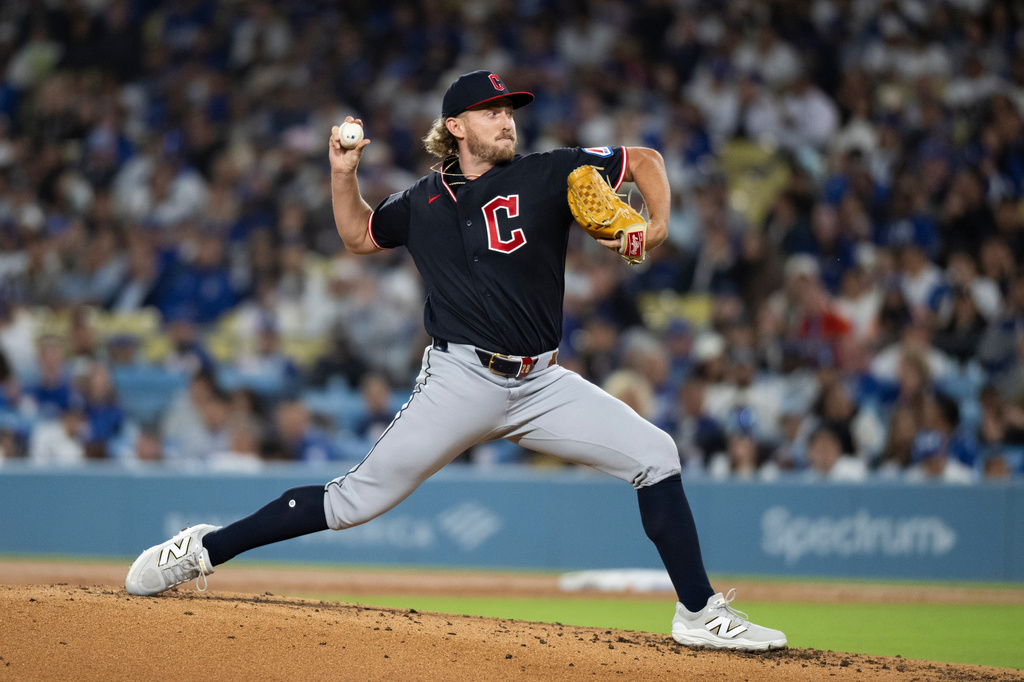 Cleveland Guardians starting pitcher Tanner Bibee delivers during the second inning of a baseball game against the Los Angeles Dodgers in Los Angeles, Tuesday, March 31, 2026. (AP Photo/Kyusung Gong)