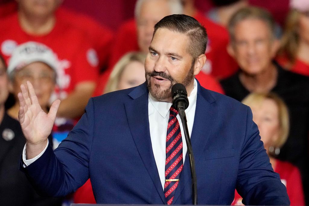 FILE - Maricopa County Recorder candidate Arizona state Rep. Justin Heap, R-Phoenix, speaks during a campaign event Oct. 22, 2024, in Peoria, Ariz. (AP Photo/Ross D. Franklin, File)