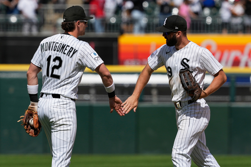 Chicago White Sox's Colson Montgomery, left, celebrates with Tristan Peters after the White Sox defeated the Detroit Tigers in a baseball game in Chicago, Sunday, May 31, 2026. (AP Photo/Nam Y. Huh)