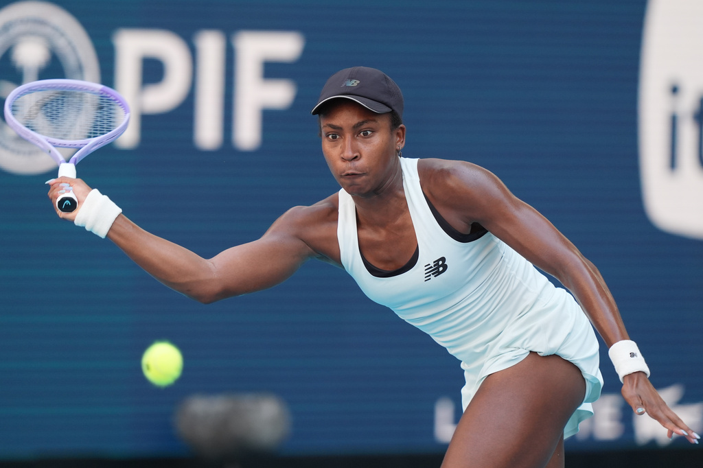 Coco Gauff returns to Aryna Sabalenka during the women's singles final at the Miami Open tennis tournament, Saturday, March 28, 2026, in Miami Gardens, Fla. (AP Photo/Marta Lavandier)