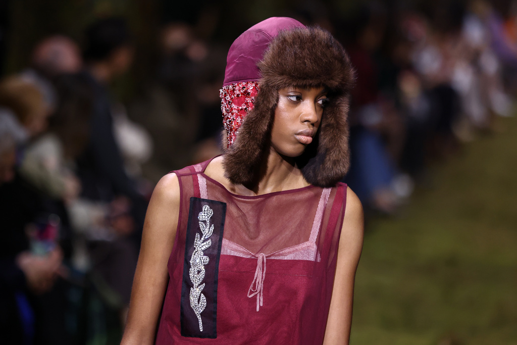 A model wears a creation from the Miu Miu Fall/Winter 2026-2027 Women's collection presented in Paris, Tuesday, March 10, 2026. (AP Photo/Tom Nicholson)