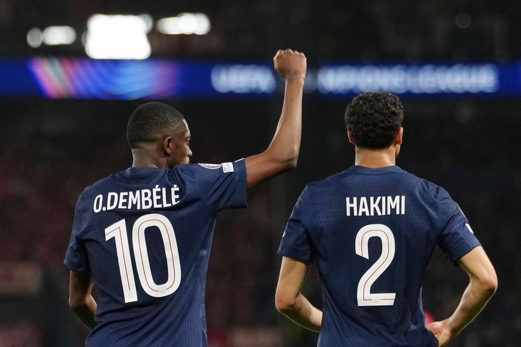 PSG's Ousmane Dembele celebrates after scoring his side's third goal during a Champions League semifinal, first leg, soccer match between Paris Saint-Germain and Bayern Munich in Paris, Tuesday, April 28, 2026. (AP Photo/Aurelien Morissard)