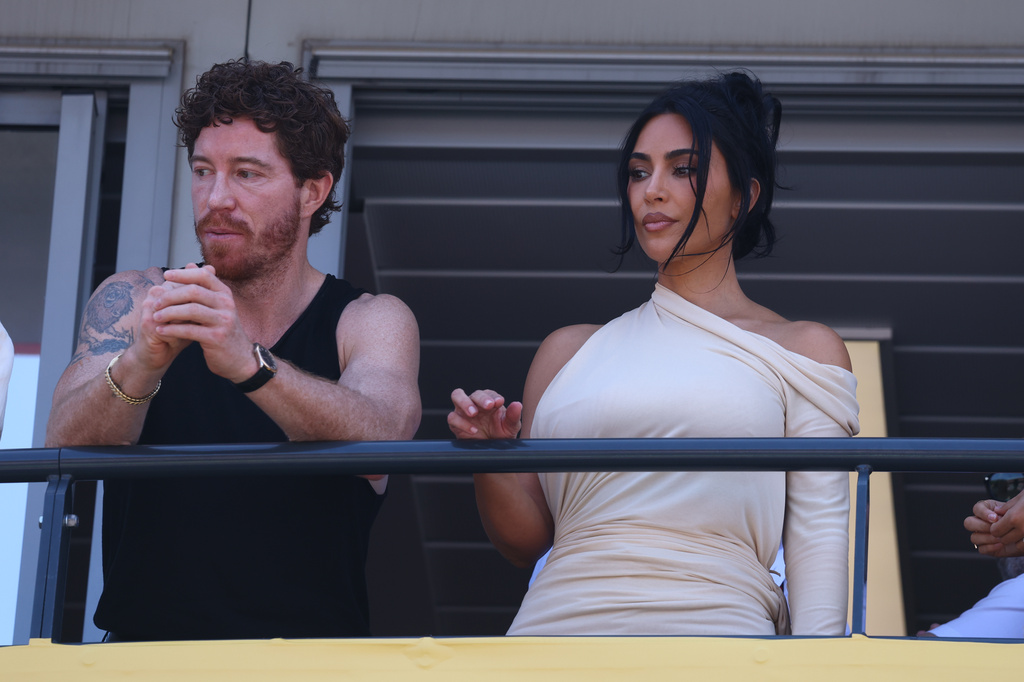 Kim Kardashian, right, attends wth former snowboarder Shaun White during the Formula One Monaco Grand Prix race at the Monaco racetrack, Sunday, June 7, 2026. (Yves Herman, Pool Photo via AP)