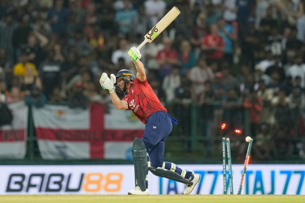 England's Jos Buttler bowled out by Sri Lanka's Eshan Malinga during the first T20 cricket match between England and Sri Lanka in Pallekele, Sri Lanka, Friday, Jan, 30. 2026. (AP Photo/Eranga Jayawardena)