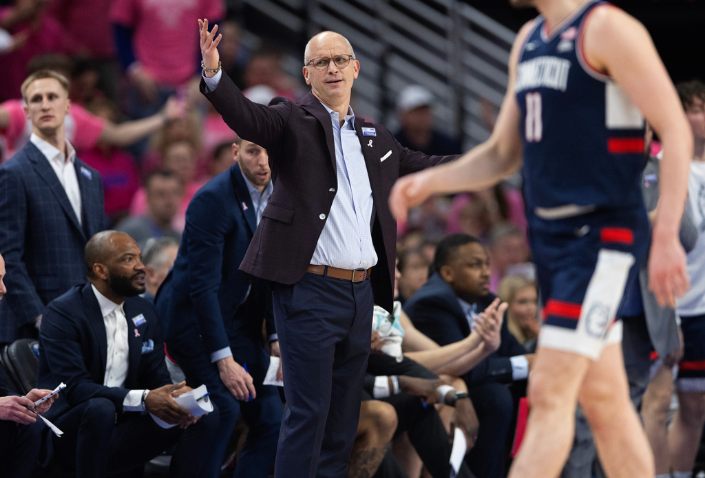 UConn head coach Dan Hurley, center, disputes a referee's call as his team plays against Creighton during the first half of an NCAA college basketball game Saturday, Jan. 31, 2026, in Omaha, Neb. (AP Photo/Rebecca S. Gratz)