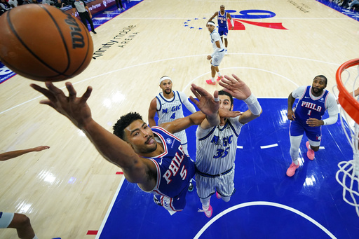 Philadelphia 76ers' Quentin Grimes, left, goes up for a shot against Orlando Magic's Goga Bitadze during the first half of an NBA basketball game Monday, Oct. 27, 2025, in Philadelphia. (AP Photo/Matt Slocum) Philadelphia 76ers' Quentin Grimes, left, goes up for a shot against Orlando Magic's Goga Bitadze during the first half of an NBA basketball game Monday, Oct. 27, 2025, in Philadelphia. (AP Photo/Matt Slocum)