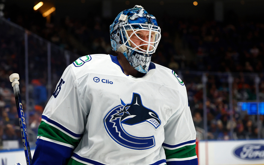 Vancouver Canucks goaltender Thatcher Demko looks on during the second period of an NHL hockey game against the New York Islanders, Friday, Dec. 19, 2025, iin Elmont, NY. (AP Photo/Noah K. Murray)