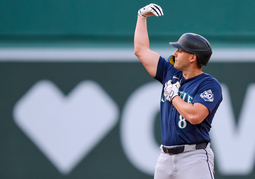 Seattle Mariners' Dominic Canzone celebrates after his RBI double during the sixth inning of a baseball game against the Boston Red Sox, Wednesday, Sept. 2, 2026, in Boston. (AP Photo/Charles Krupa)