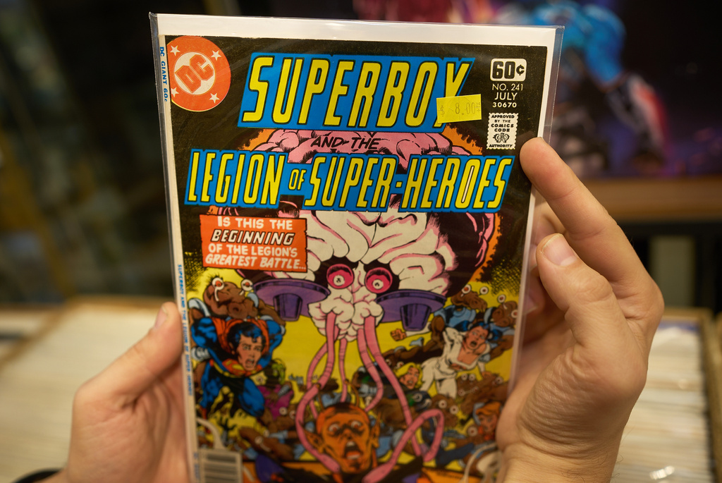 A comic book titled "Superboy and the Legion of Super Heroes" has an "Approved by the Comics Code Authority" seal on the top right corner, is displayed at the Golden Apple Comics store, in Los Angeles, Tuesday, Nov. 18, 2025. (AP Photo/Damian Dovarganes)