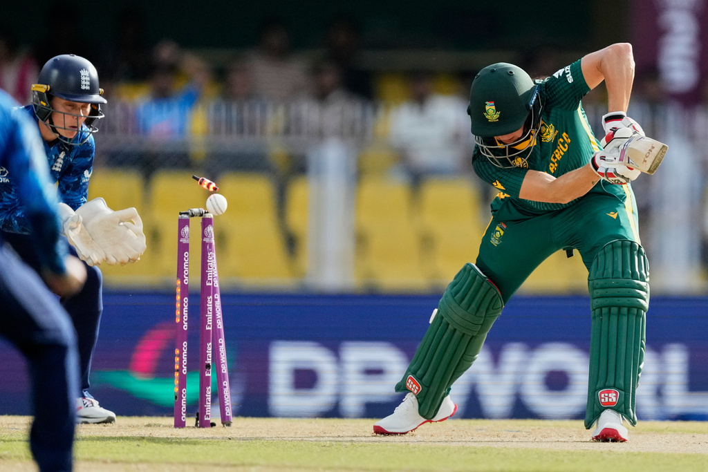 South Africa's Tazmin Brits is bowled out by England's Linsey Smith during the ICC Women's Cricket World Cup match between England and South Africa at Barsapara Cricket Stadium in Guwahati, India, Friday, Oct. 3, 2025. (AP Photo/Anupam Nath)