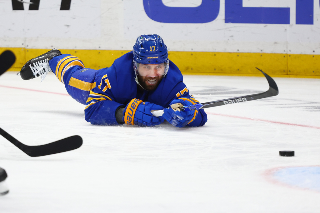 Buffalo Sabres left wing Jason Zucker is tripped during the first period in Game 2 of a second-round NHL hockey Stanley Cup playoff series against the Montreal Canadiens, Friday, May 8, 2026, in Buffalo, N.Y. (AP Photo/Jeffrey T. Barnes)