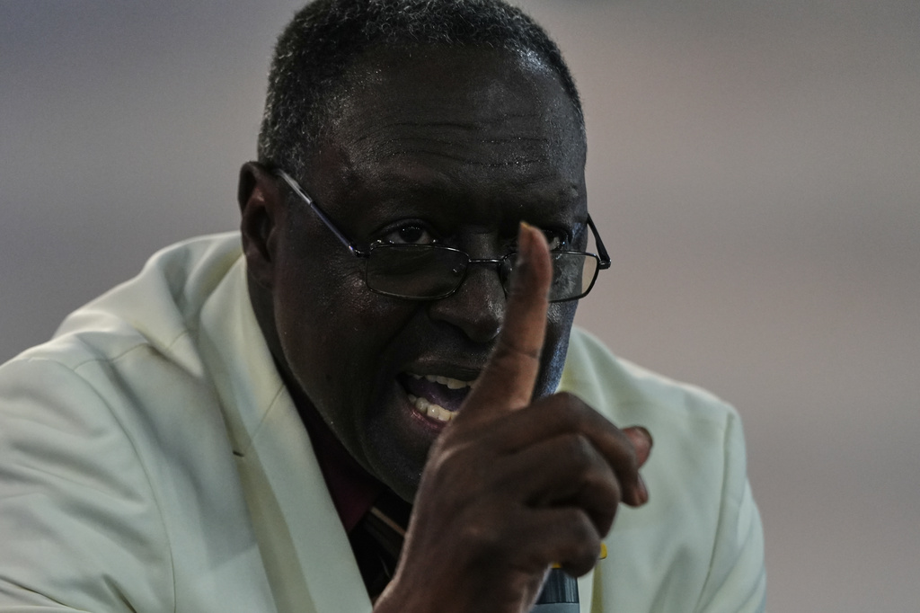 Roosevelt Toussaint, the senior pastor of the Word of Life Center church, delivers his sermon titled "What to do in a time of crisis?" at a service in Salisbury, Md., Sunday, Aug. 2, 2026. (AP Photo/Luis Andres Henao)