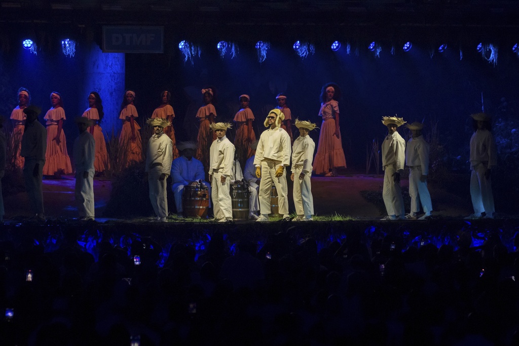 Bad Bunny performs during the final concert of his summer residency in his homeland at the Coliseo de Puerto Rico Jose Miguel Agrelot, in San Juan, Puerto Rico, Saturday, Sept. 20, 2025. (AP Photo/Alejandro Granadillo)