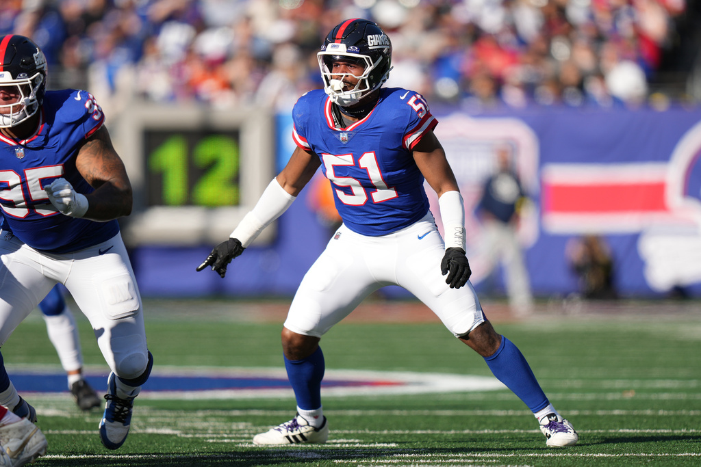 FILE - New York Giants linebacker Abdul Carter (51) defends near the line of scrimmage during an NFL football game against the San Francisco 49ers, Nov. 2, 2025, in East Rutherford, NJ. (AP Photo/Peter Joneleit, File)