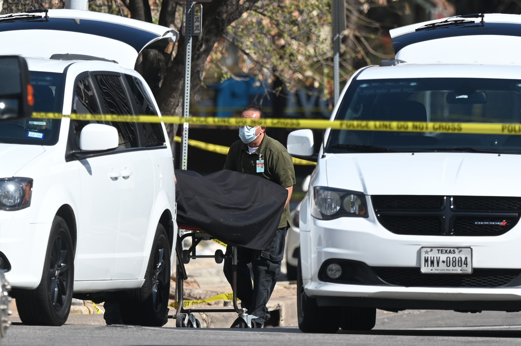 The Austin Police Department and the FBI investigate a shooting at Buford's on 6th Street on Sunday, March 1, 2026, in Austin, Texas. (AP Photo/Jack Myer)