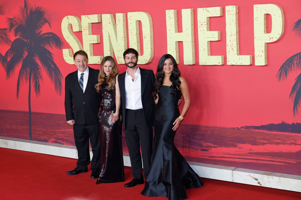 Director Sam Raimi, from left, Rachel McAdams, Dylan O'Brien and producer Zainab Azizi pose for photographers upon arrival at the premiere for the film "Send Help" in London, Thursday, Jan. 29, 2026. (Photo by Millie Turner/Invision/AP)