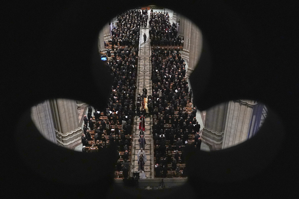 The casket with former Vice President Dick Cheney is carried out of the Washington National Cathedral after services, Thursday, Nov. 20, 2025 in Washington. (AP Photo/Matt Rourke)