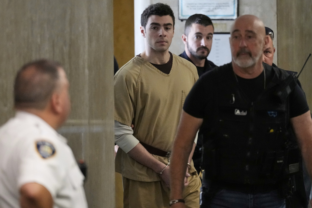 Luigi Mangione is escorted into Manhattan state court in New York, Tuesday, Sept. 16, 2025. (AP Photo/Seth Wenig)