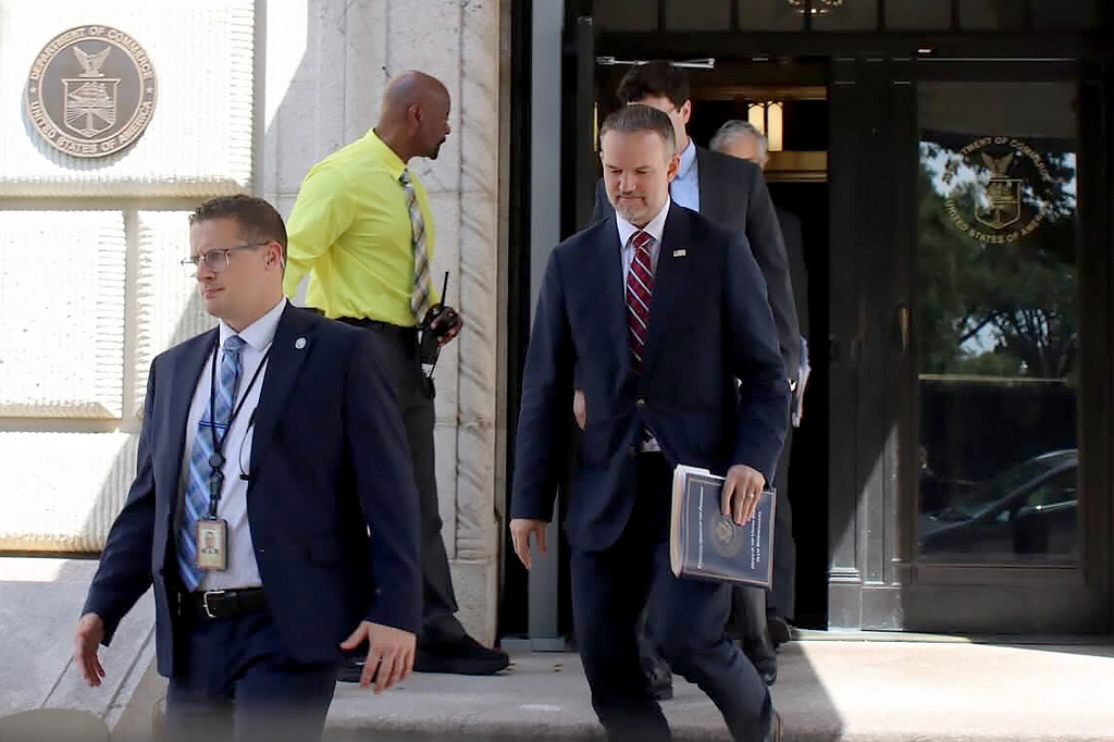 United States Trade Representative Jamieson Greer, center, leaves the U.S. Department of Commerce following a meeting with Canadian officials, in Washington, Monday, Aug. 17, 2026. (Kelly Geraldine Malone/The Canadian Press via AP)