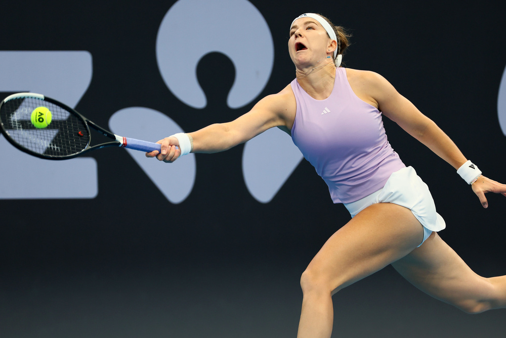 Karolína Muchova, of the Czech Republic, plays a shot during her semifinal match against Aryna Sabalenka, of Belarus, at the Brisbane International tennis tournament in Brisbane, Australia, Saturday, Jan. 10, 2026. (AP Photo/Tertius Pickard)
