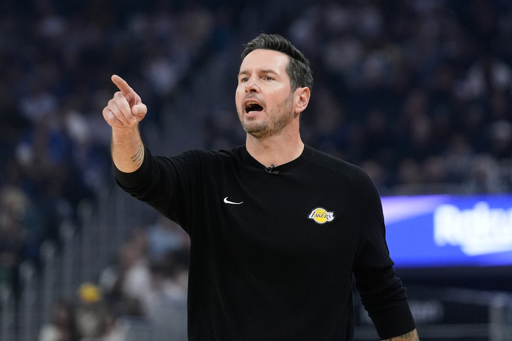 Los Angeles Lakers head coach JJ Redick gestures during the first half of an NBA basketball game against the Golden State Warriors in San Francisco, Thursday, April 9, 2026. (AP Photo/Jeff Chiu)