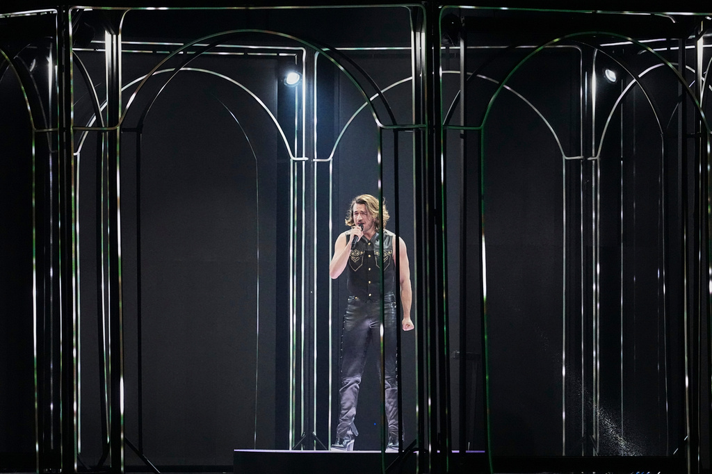 Aidan from Malta performs the song "Bella" during the dress rehearsal for the second semifinal of the 70th Eurovision Song Contest in Vienna, Austria, Wednesday, May 13, 2026. (AP Photo/Martin Meissner)